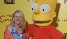 Nancy Cartwright and aperson in costume as Bart Simpson arrive at The Simpsons Treehouse of Horror XX & 20th Anniversary Party in the Barker Hangar on Sunday, Oct. 18, 2009, in Santa Monica, CA. (AP Photo/Alaric Lambert) Foto: ap