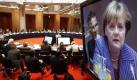 Ein Monitor zeigt am Sonntag (03.07.11) in Berlin Bundeskanzlerin Angela Merkel (CDU) beim Reden auf dem zweiten Petersberger Klimadialog. Internationale Delegationen treffen sich am Sonntag im Rahmen des Klimadialoges, um den Weltklimagipfel im suedafrikanischen Durban im November vorzubereiten. (zu dapd-Text) Foto: Thomas Peter/dapd Foto: dapd