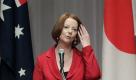 Australian Prime Minister Julia Gillard adjusts her hair while giving a speech at a luncheon hosted by the Japan-Australia Business Co-operation Committee in Tokyo Thursday, April 21, 2011. Gillard arrived in Tokyo Wednesday for a four-day official visit to Japan. (AP Photo/Koji Sasahara) Foto: dapd