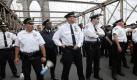 In this Oct. 1, 2011 photo, police turn to face the front line of protesters who walked behind them about one third of the way onto New York's Brooklyn Bridge before police began making arrests during Saturday's march by Occupy Wall Street. Protesters speaking out against corporate greed and other grievances attempted to walk over the bridge from Manhattan, resulting in the arrest of more than 700 during a tense confrontation with police. The majority of those arrested were given citations for disorderly conduct and were released, police said. (ddp images/AP Photo/Stephanie Keith) Foto: dapd