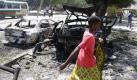 ... gehört die Gewalt zum Alltag: Ein Mädchen geht nach einem Autobombenanschlag in Mogadischu an den verkohlten Resten vorbei. Somalias Präsident ... Foto: dpa