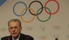 International Olympic Committee President Jacques Rogge speak during a press conference in the city of Durban, South Africa, Monday, July 4, 2011.  Munich has called in German football great Franz Beckenbauer for its final push to host the 2018 Winter Olympics. Munich Bid Committee Chair Katarina Witt says Beckenbauer will arrive in Durban on Tuesday, a day before IOC members vote on whether Munich; Annecy in France; or Pyeongchang in South Korea will stage the games. (AP Photo/Schalk van Zuydam) Foto: dapd