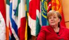 Bundeskanzlerin Angela Merkel wartet auf der 100. Konferenz der Internationalen Arbeitsorganisation ILO im Sitz der Vereinten Nationen im schweizerischen Genf darauf, ihre Rede halten zu dürfen. Jedes Jahr treffen sich die Mitgliedstaaten der Sonderorganisation der UN, um über soziale Gerechtigkeit sowie Menschen- und Arbeitsrechte zu diskutieren. Foto: dpa