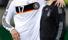 Germany's Per Mertesacker, left, and goalkeeper Robert Enke, right, are seen after a World Cup group 4 qualifying soccer match between Germany and Liechtenstein in Leipzig, Germany, Saturday, March 28, 2009. Germany defeated Liechtenstein by 4-0. (AP Photo/Michael Sohn) Foto: ap