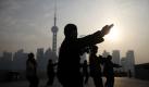 ocal people practice traditional taichi at the daybreak of Tuesday, Jan. 4, 2011 in Shanghai, China. (AP Photo/Eugene Hoshiko) Foto: dapd