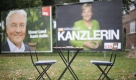 Der Herausforderer und die Kanzlerin werben um Stimmen. Foto: ap
