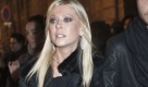 U.S actress Tara Reid, left, and Michael Liloelund leave the Valentino' spring/summer 2011 fashion collection, in Paris, Wednesday Jan. 26, 2011. (AP Photo/Thibault Camus) Foto: dapd