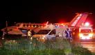 Rettungshelfer warten auf dem Catam Flughafen in Bogota auf verletzte Passagiere. Auf der Insel San Andres in Kolumbien ist eine Passagiermaschine verunglückt. Die Boeing 737 mit 131 Menschen an Bord zerbrach nach einem Blitzeinschlag in drei Teile. Ein Passagier starb, 120 Menschen wurden verletzt. Foto: dpa