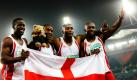 Medaillenregen für Leon Baptiste: Der Engländer (von links nach rechts) hat gemeinsam mit seinen Kollegen Ryan Scott, Mark Lewis-Francis und  Marlon Devonish die 4 x 100-Meter-Staffel der  Commonwealth Spiele gewonnen und damit seine zweite Goldmedaille. Zuvor hatte er bereits beim 200-Meter-Lauf der Männer Gold geholt. Foto: dapd