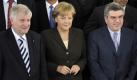Bundeskanzlerin Angela Merkel (M.) macht sich für die Münchner Olympiabewerbung stark. Foto: dpa