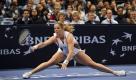 Die belgische Tennisspielerin Kim Clijsters zeigte im Spiel gegen Venus Williams ganzen Körpereinsatz. Doch es nützte nichts. Trotz Spagats ihrer Gegnerin war am Ende die US-Amerikanerin die strahlende Siegerin beim Billie Jean King Cup im Madison Square Garden in New York. Foto: ap