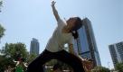 (ap) Yoga in the Park  	

Sayuri Yamanaka takes a yoga class, accompanied her son Iker, at the Republic Square Park in downtown Austin, Texas on Wednesday April 28, 2010. Every Wednesday in April from noon to 1 pm, Yoga Yoga puts on Yoga in the Park, a free event open to all ages and skill levels. It was Yamanaka's first time. She said she loved the experience and although practicing yoga is a very personal experience, it was wonderful to share it with all the different people gathered at the park. (AP Photo/American Statesman, Alberto Martinez) MAGS OUT, NO SALES, TV OUT, INTERNET OUT: AP MEMBERS Foto: ap