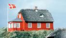 Mit dem kann man dann an der dnischen Kste anlegen und es sich im Ferienhaus gemtlich machen. Foto: dpa