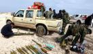 Libysche Rebellen am letzten Checkpoint vor Ras Lanuf, etwa 60 km vor der ostlibyschen Stadt Brega. In Tripolis fallen derweil Schüsse, über deren Ursprung allerdings keine Klarheit herrscht: Sind die Aufständischen schon in der Hauptstadtoder feiern Gaddafis Truppen ihren Sieg? Foto: dpa