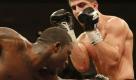 England's Ola Afolabi, left, punches Germany's Marco Huck in a WBO cruiserweight world championship fight in Ludwigsburg, Germany, Saturday, Dec. 5, 2009. Huck won the fight after 12 rounds by points. (AP Photo/Thomas Kienzle) Foto: ap