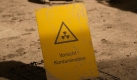 Ein Behälter mit kontaminierter Flüssigkeit steht vor der Kammer 12 in der Schachtanlage Asse II. Foto: dpa