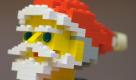 Ein moderner Lego-Weihnachtsmann steht am Donnerstag (26.11.2009) in der traditionellen Weihnachtsausstellung im Dresdner Landhaus. Unter dem Motto 'Glaubt ihr an den Weihnachtsmann? Wir schon!' soll den Besuchern Kulturgeschichtliches von Nikolaus, Christkind und Weihnachtsmann erzählt werden. Rund 200 figürlich Darstellungen des Weihnachtsmannes in verschiedenen Varianten werden vom 28.11.2009 bis zum 10.01.2010 präsentiert. 
 Foto: dpa