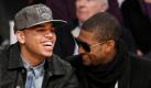 Chris Brown, left, and Usher have a moment during the first half of an NBA basketball game with the Los Angeles Lakers against the Boston Celtics, Thursday, Feb. 18, 2009, in Los Angeles. (AP Photo/Lori Shepler) Foto: AP