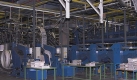 Hier werden die Werbebeilagen in die fertige Zeitung eingelegt. In diesem Bereich werden gerade für 15 Millionen Euro neue Maschinen aufgebaut - trotz der schlechten Wirtschaftslage. Foto: Leipziger Zeitungdruckerei