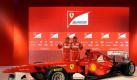 Der Rennwagen F150th Italia von der Scuderia Ferrari mit den Fahrern Felipe Massa (l) und Fernando Alonso. Foto: dpa