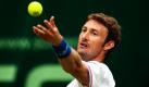Der spanische Tennis-Profi Juan Carlos Ferrero schlägt in der ersten Runde der Gerry Weber Open im westfälischen Halle gegen den Deutschen Dominik Meffert auf. Der Spanier unterlag mit 3:6 und 5:7. Foto: dpa