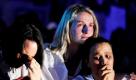 Fans des verstorbenen Popstars Michael Jackson verfolgten in Köln im Alten Wartesaal die Live-Übertragung der Trauerfeier ihres Idols. Foto: ddp