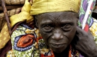Eine kongolesische Frau auf der Flucht Foto: dpa