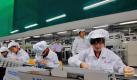 Foxconn-Mitarbeiter des Werkes Lunghua in Shenzhen. Foto: Ym Yik Foto: dpa
