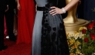 Schwarz scheint die neue Lieblingsfarbe von Kate Winslet zu sein. Bei fast allen Preisverleihungen trug sie die markante Farbe. Zur Oscar-Nacht bezauberte sie in einer asymetrischen Robe von Atelier Yves Saint Laurent by Stefano Pilati. Foto: ap