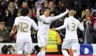 Real-Star und 1:0-Torschütze Cristiano Ronaldo (M) lässt sich von Pepe (r) und Marcelo Vieira feiern. Foto: Gustavo Cuevas Foto: dpa
