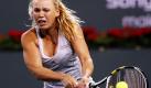 Die DäninCaroline Wozniacki bei einem Return gegen die Russin Maria Kirilenko bei den BNPParibas Open in Kalifornien.Wozniacki setzte sich in zwei Sätzen mit 6:0 und 6:3 durch. Foto: ap