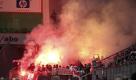 Bengalische Feuer brennen im Kölner Fanblock in der Leverkusener BayArena. Das Spiel endete 0:0. Foto: ddp