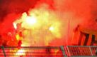 Feuerwerkskörper explodieren im Dresdner Fanblock beim DFB-Pokalspiel in Dortmund. Foto: Kevin Kurek Foto: dpa