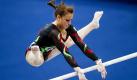 Die Italienerin Vanessa Ferrari turnt bei der WM in Rotterdam am Reck. Foto: dpa