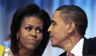 US-Präsident BarackObama spricht in Kopenhagen, Dänemark, mit seiner Frau Michelle. Beide sind zur Bekanntgabe der Gastgeberstadt für die Olympischen Spiele 2016 angereist. Foto: ap