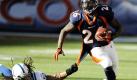 Linebacker Philip Wheeler von den Indianapolis Colts will Runnig Back Laurence Maroney von den Denver Broncos nicht vorbei lassen. Das Spiel in der National Football Leauge gewannen die Colts letztlich auch mit 27:13. Foto: ap