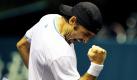 Der deutsche Benjamin Becker triumphiert angesichts seines Sieges über den Spanier Fernando Verdasco im Match der zweiten Runde der Thailand Tennis Open in der Impact Arena in Bangkok. Becker schlug seinen Gegner mit 6:4 und 6:4. Foto: dpa