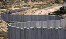 A view of the controversial 'separation barrier,' or wall at the Shuafat refugee Camp on the northern outskirts of jerusalem on 17 May 2009 as Israeli Prime Minister Benjamin Netanyahu arives in Washington DC to hold his first talks with US President Barack Obama. It is believed Netanyahu will propose that joint teams draft a new road map for the Palestinian peace process and a new strategy on Iran, but that the Israeli leader will not back a 'two states for two peoples' peace plan. Foto: dpa