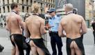 Police questions four 'naked butlers' as they serves pedestrians at Martin Place in Sydney, Australia, on 14 September 2010. The men were part of a promotion to advertise a brand of water crackers. EPA/PAUL MILLER AUSTRALIA AND NEW ZEALAND OUT +++(c) dpa - Bildfunk+++
pixel
Keywords
society , Social_Issues , SOI Gesellschaft Society , company
pixel
Title 
Nackte Butler bediene...  
Persons
 
Continent
-
Country
Australia  
Province
-
City
Sydney
pixel Foto: dpa