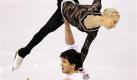 Maria Mukhortova and Maxim Trankov, of Russia, skate during the pairs free skate competition at the World Figure Skating Championships in Los Angeles, Wednesday March 25, 2009. (AP Photo/David J. Phillip) Foto: ap