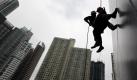 Keine Kunst, nur Übung: Philippinische Rettungskräfte bei einem Training für Erdbebennotfälle in Makati City. Foto: Francis R. Malasig Foto: dpa