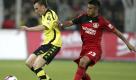 Gegner auf dem Platz, aber offensichtlich derselbe Friseur: Kevin Großkreutz (l.) und Arturo Vidal. Foto: ddp