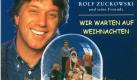Rolf Zuckowski hat seine Freunde, also ein paar Kinder und den Weihnachtsmann, kurzerhand in eine Schneekugel gesperrt. So wird das natürlich nichts mit dem perfekten Weihnachtsfest! Foto: Polydor (Universal)
