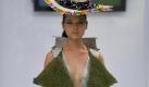 So sehen die Kreationen des kolumbianischen Designers Daniela Aristizabal aus, die während der Biomodenschau in Kolumbien gezeigt werden. Die Kleider sind aus organischen Materialen wie Federn, Pflanzensamen und Blumen. Foto: dapd