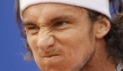 Juan Monaco of Argentina reacts after winning a point during a match against Simon Greul of Germany at the BCR Tennis Open tournament in Bucharest, Romania, Saturday, Sept. 26, 2009. Monaco won the game in two sets and advanced to the final of the tournament. (AP Photo/Vadim Ghirda) Foto: ap