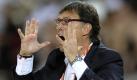 Auch Gerardo Martino hat klare Vorstellungen, verpackt in feine parallele Streifen. Dass Paraguay nach einem schwachen Spiel doch noch im Elfmeterschießen gegen Japan gewinnen konnte, hat er allerdings wohl eher dem Glück zu verdanken. Foto: ap