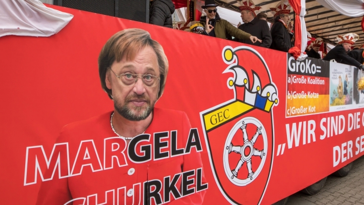 Die neue GroKo dürfte bei den Rosenmontagsumzügen 2018 ihr Fett wegbekommen.