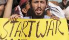 Supporters of Islamic party Sunni Tehrik carry placards during a protest to condemn the republication of a controversial caricatures depicting the Prophet Mohammed, in Karachi Pakistan 29 February 2008. Leading Danish newspapers on 14 February 2008 re-published caricatures of Danish cartoonist Kurt Westergaard, a day after police said they had averted an alleged plot to kill Westergaard, whose cartoons published by the newspaper Jyllands-Posten in September 2005 had sparked protests in many Muslim countries. EPA/REHAN KHAN +++(c) dpa - Bildfunk+++  Foto: dpa