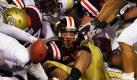Nur noch ein kleines Stück: Mit letzter Kraft versucht Quarterback Logan Thomas (Mitte) die gegnerische Endzone zu erreichen und einen Touchdown zu erzielen. In diesem Versuch hat es für den Spielmacher von Virginia Tech nicht gereicht, sein Team schlug Georgia Tech trotzdem mit 37:26. Foto: dapd