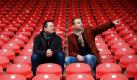 Architekt Matthias Rätzel (links) und der Geschäftsführer der Eintracht Braunschweig GmbH, Sören Oliver Voigt, unterhalten sich in Braunschweig im Stadion des Fußballvereins des Vereins auf der Haupttribüne. Die Braunschweiger sind am Sonntag aufgerufen, ihr Kreuzchen zu machen: Ja oder Nein zum umstrittenen Ausbau des Fußballstadions, das 14,5 Millionen Euro kosten soll. Foto: dapd